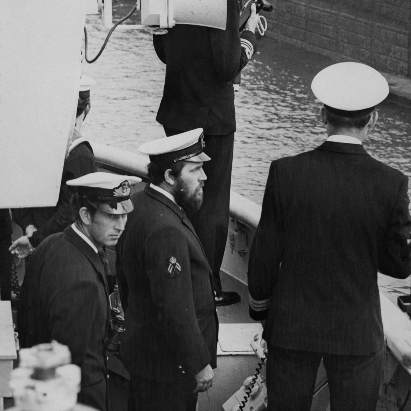 On duty on the bridge as HMS Jupiter comes alongside at Devonport, c1970s