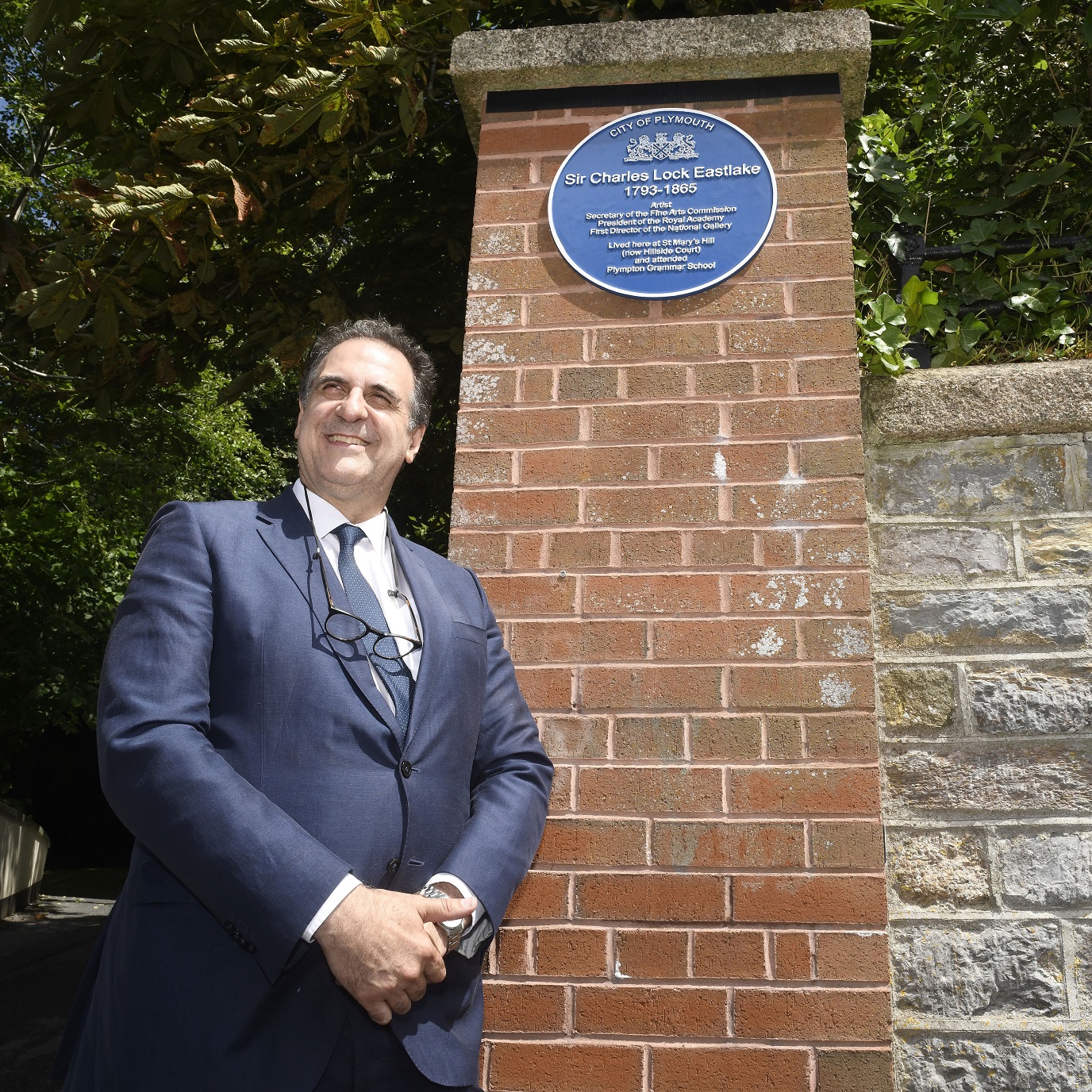 Sir Gabriele Finaldi standing by the Eastlake plaque