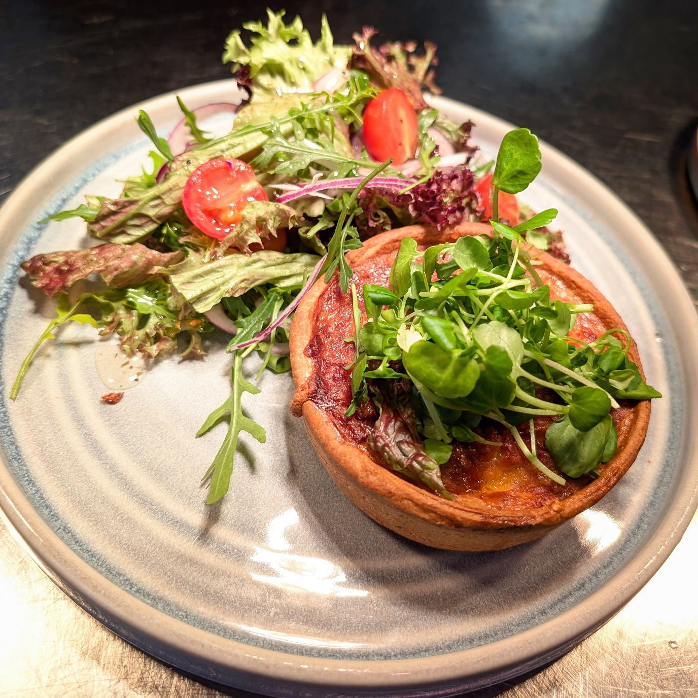 A quiche served in The Box Kitchen & Bar